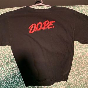 Dope shirt black and red brand new I haven’t ever worn it. No tags tho